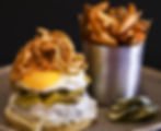 Open burger and french fries on the side 