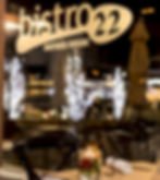 Reflected window with Bistro 22 logo